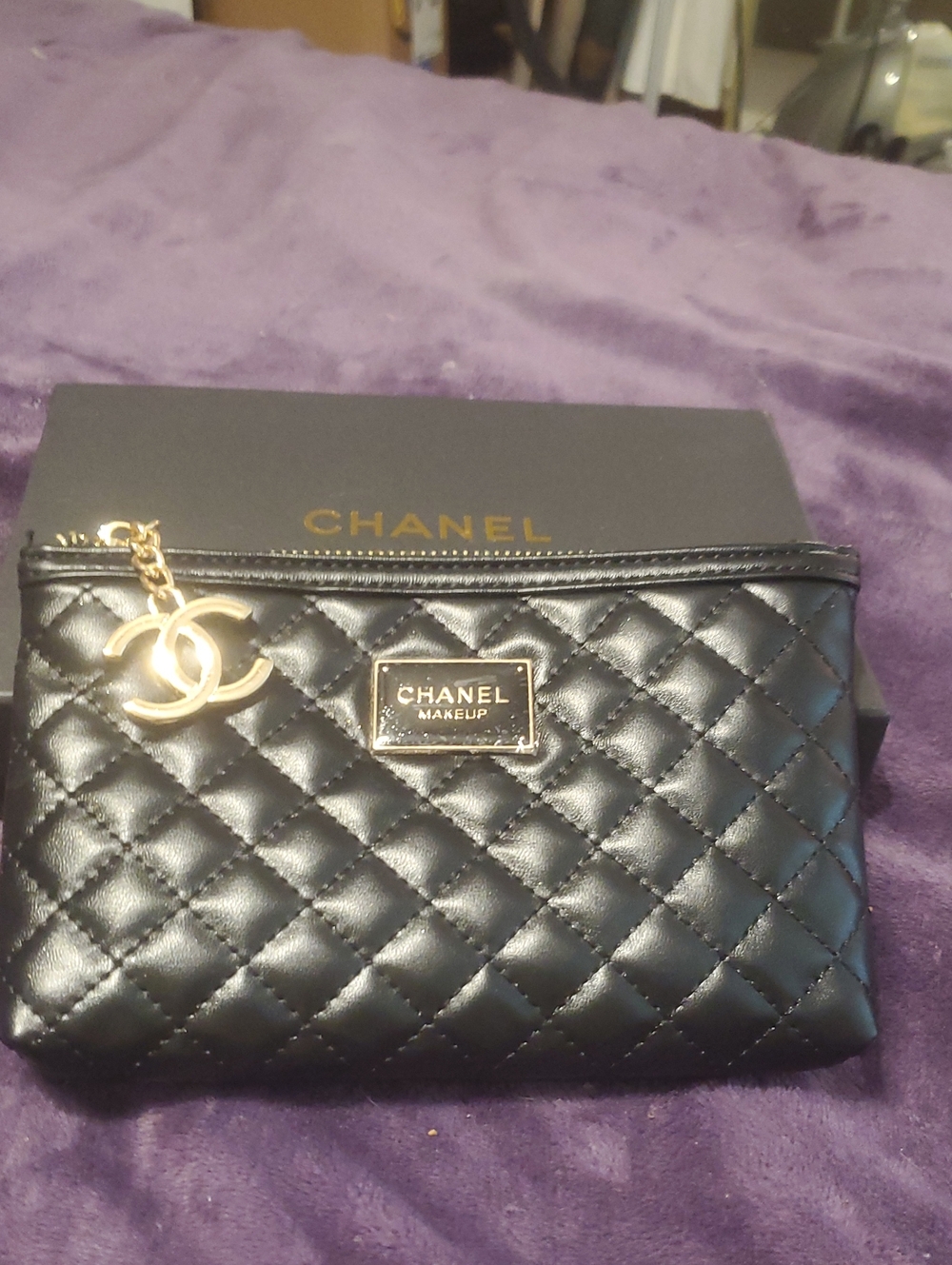 CHANEL Black Quilted Makeup Pouch with Gold CC Charm